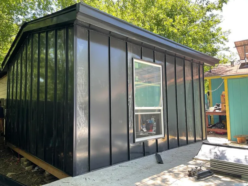 Black standing seam metal wall panels for Metal Roof Installation in South Monrovia Island